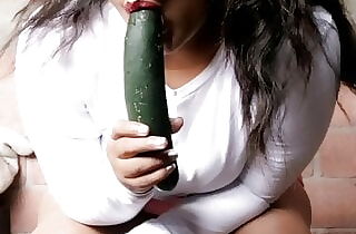 Alone at home with a cucumber
