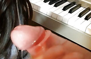 Blowjob on the piano - again interrupted by a rigid cock.