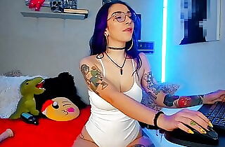 Colombian with purple hair, glasses and tattooed has the bod of a sexual goddess, she seduces you from her room