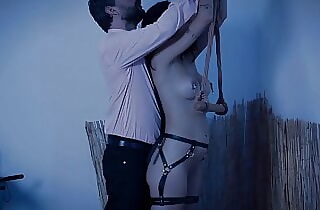 Submissive brat in a bondage session